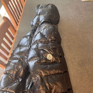 The coat is like new only a little fading on the zipper